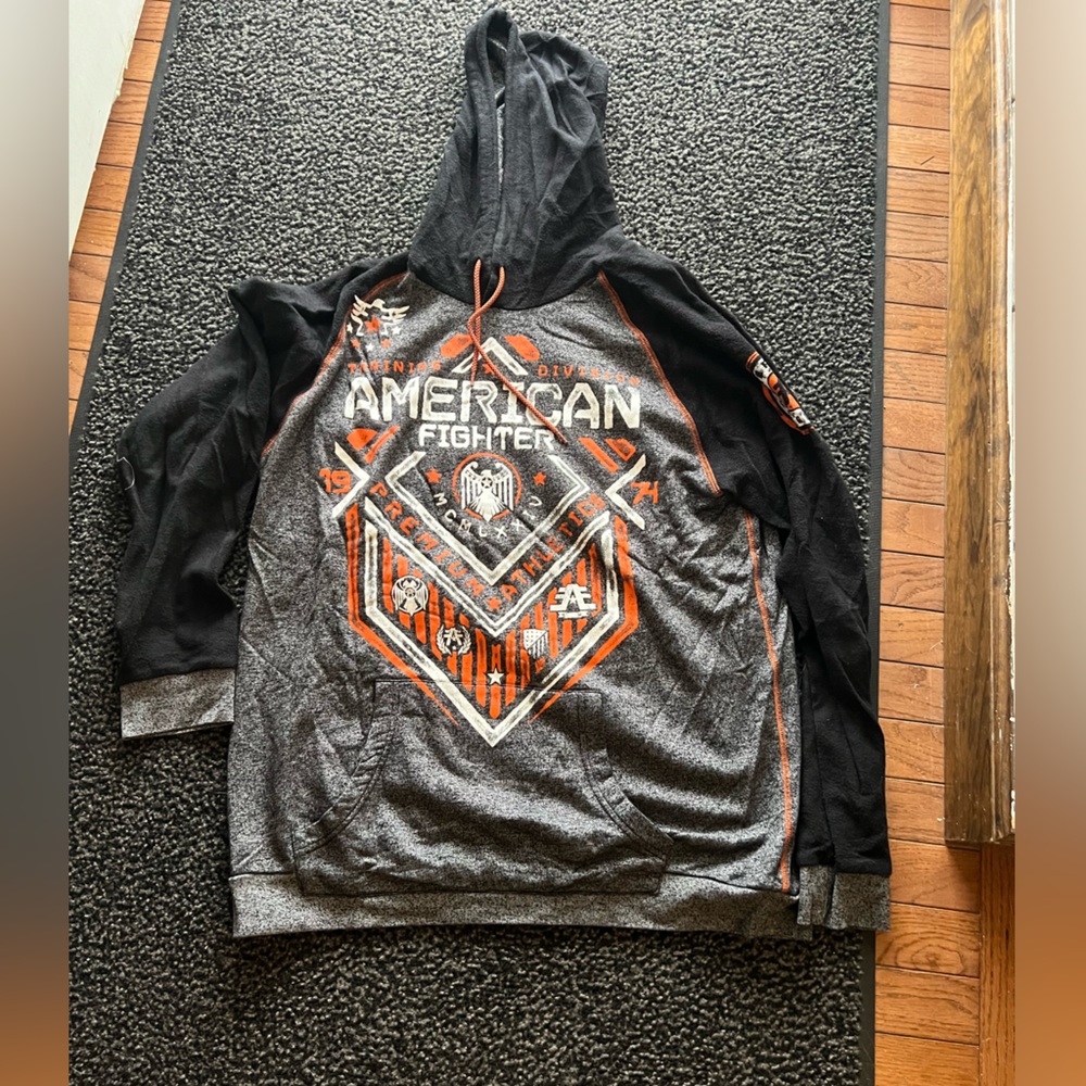 American Fighter size XL. Long sleeved hooded shirt.  Lightly worn.